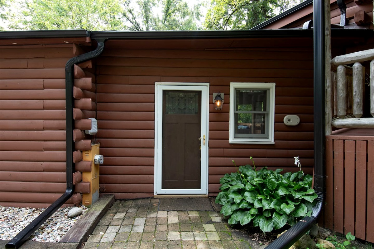 Front door to shared sunroom. This door has an electronic lock with the same code as the front door of the cabin so if you wish to enter the cabin a different way, you can.
