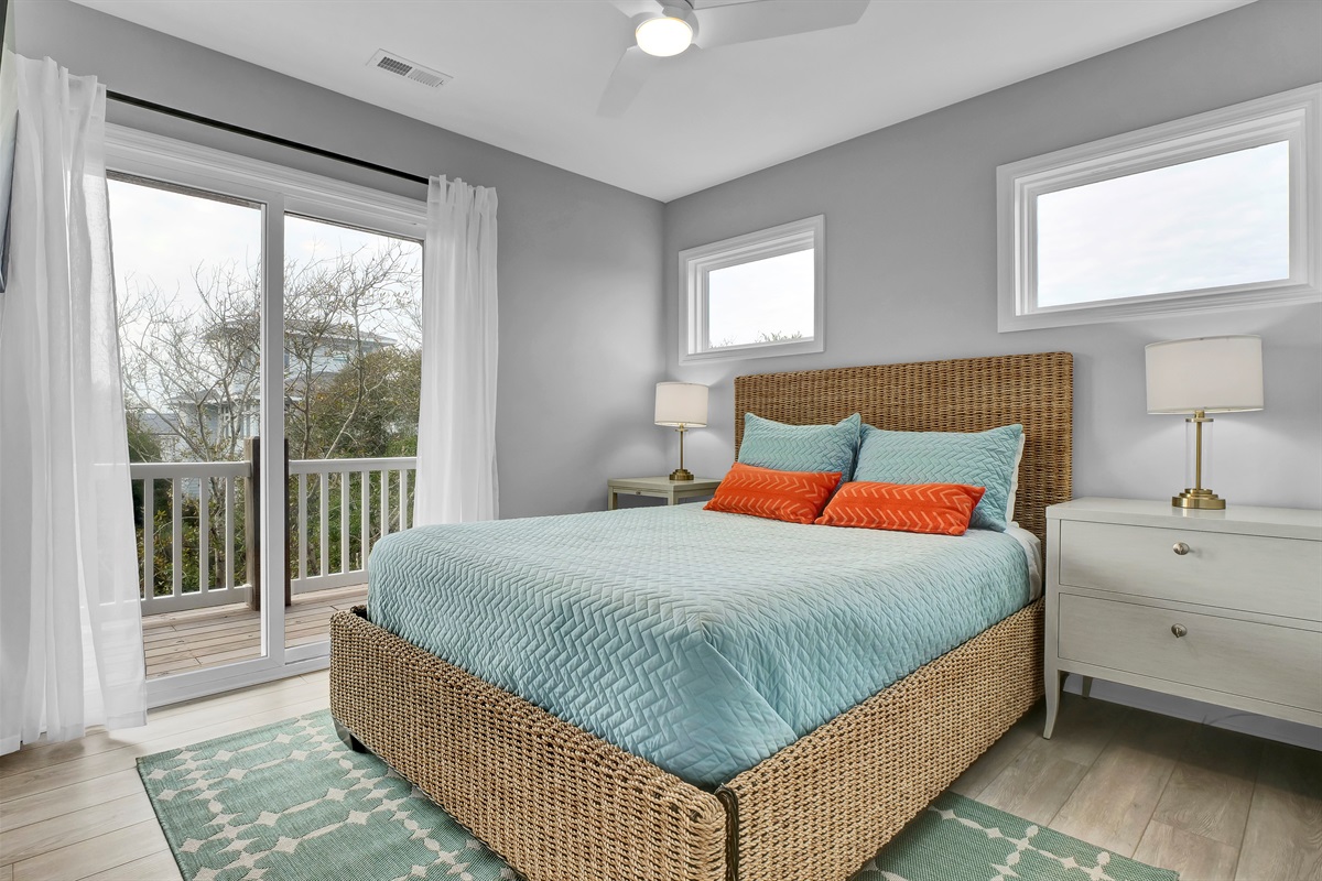 This comfortable queen bedroom with shared hall bath is perfect for families or groups traveling together.