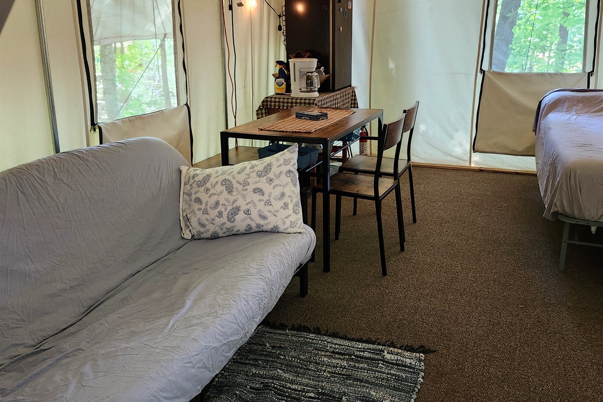 Futon couch set up w/o the woodstove