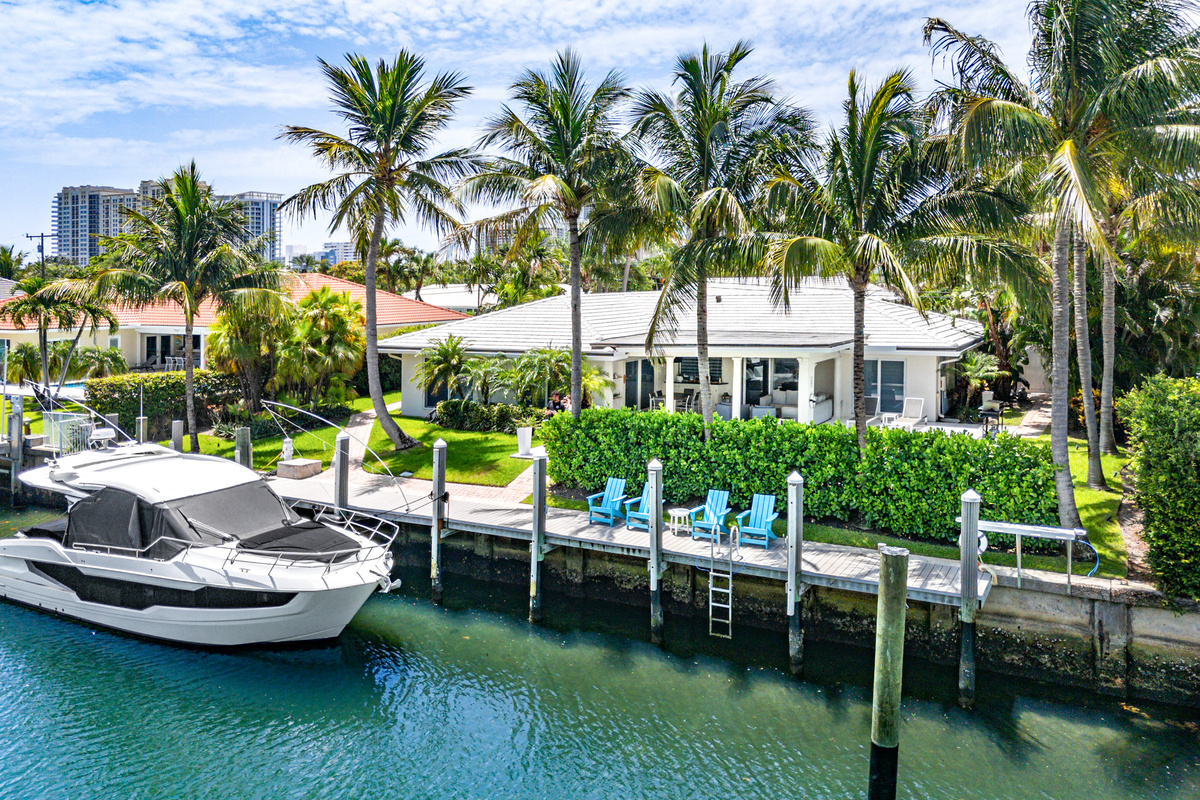 The boat shown is privately owned and not available for guest use. A separate portion of the dock is available for approved guest boats, subject to size restrictions and an additional fee.