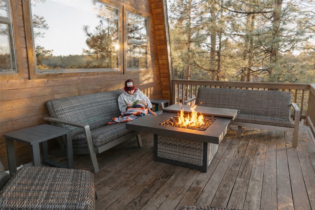 The wraparound deck at Poppywood Pines offers multiple seating areas with forest views. This Show Low cabin provides perfect spots for relaxation at any time of day, surrounded by ponderosa pines and fresh mountain air in the heart of the White Mountains.