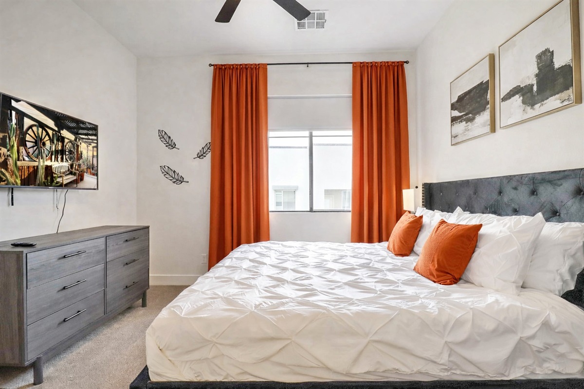 Comfortable bedroom with a plush bed, soft linens, and a calm, cozy atmosphere designed for a restful night’s sleep. Simple, clean, and perfect for relaxing after a long day.