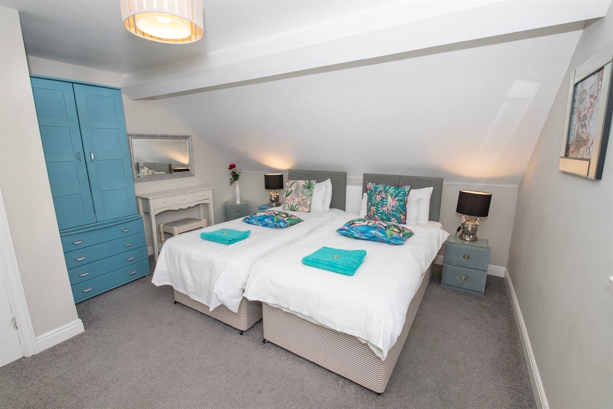 Master room with two twin beds