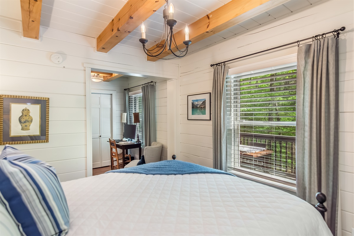 Main floor bedroom with sitting area and workstation!