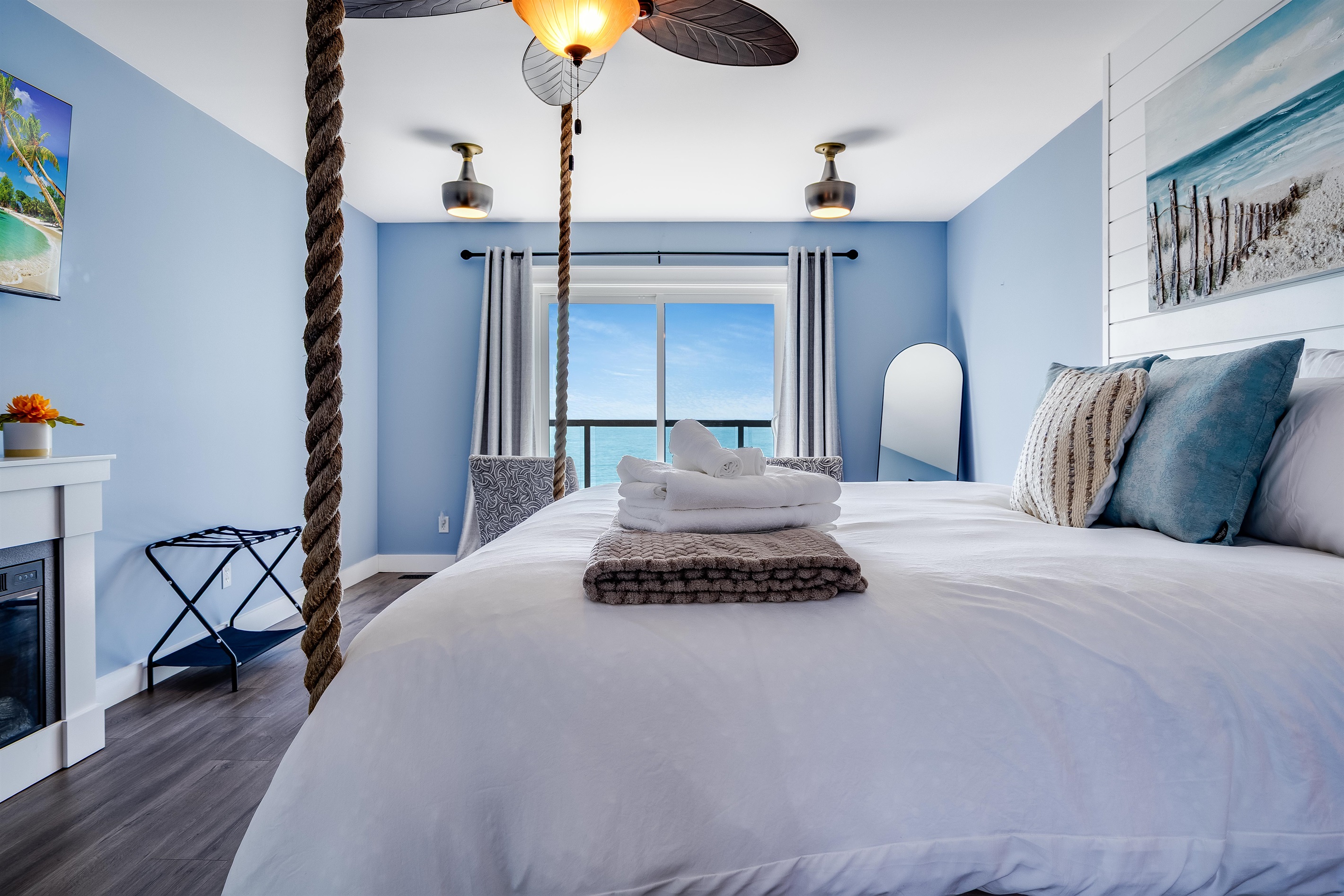 Master Bedroom with King bed and access to second story balcony with calming lake views