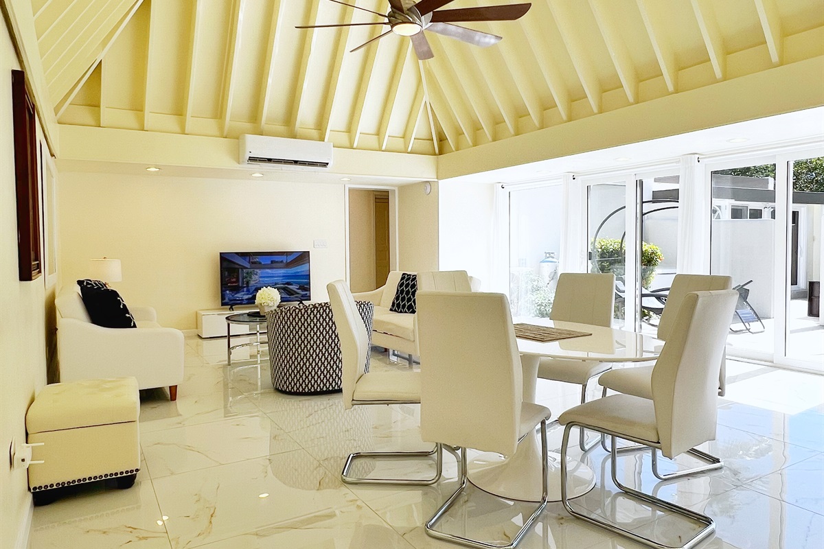 Simple elegance meets comfort in this thoughtfully designed dining space.