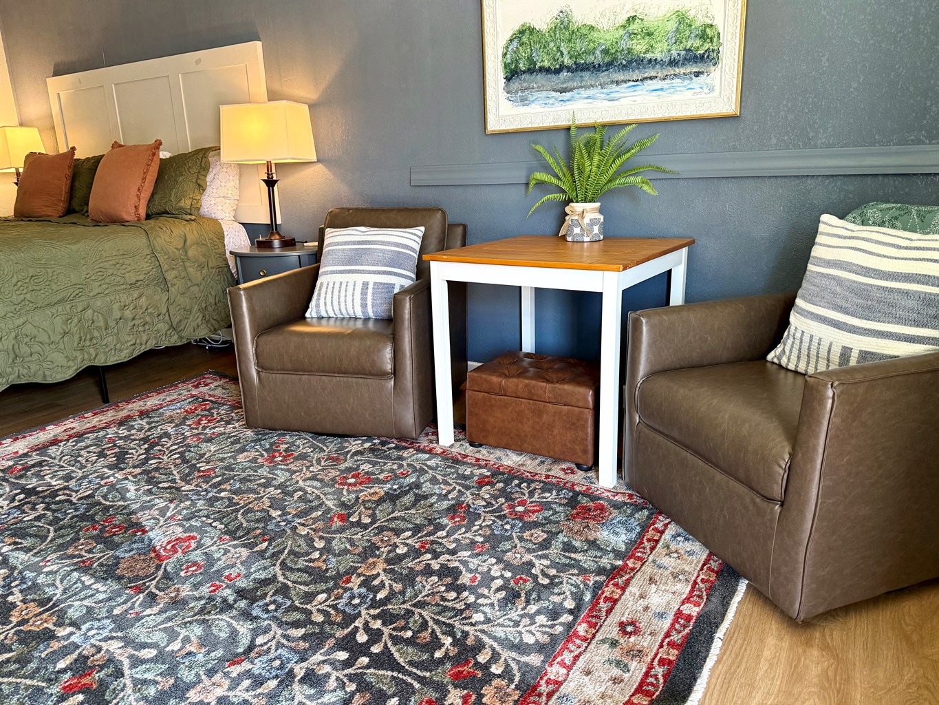 Seating area with ottoman.