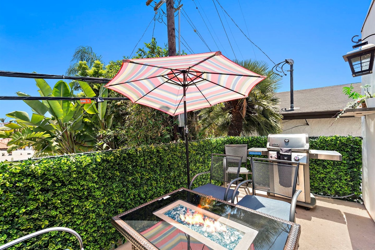 Your own private balcony with a grill, fire pit and outdoor seating.