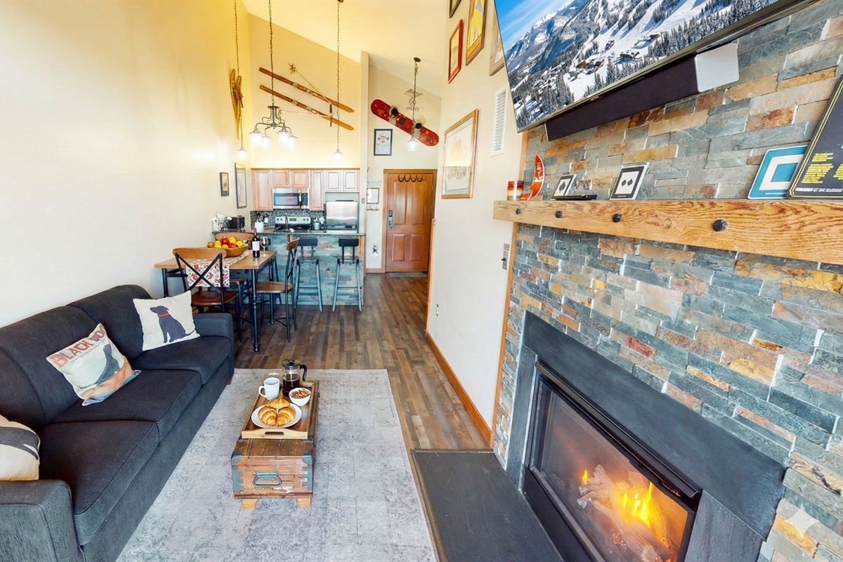 Vaulted ceilings, ski lodge décor, and natural light make this space your Snowshoe retreat.