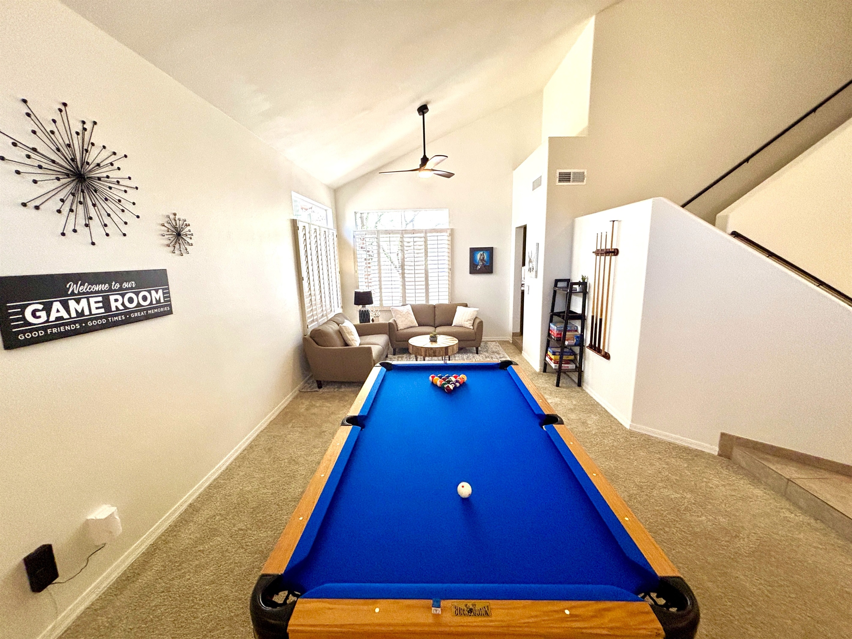 Game room with lounge area, pub seating, pool table, board games for the whole family