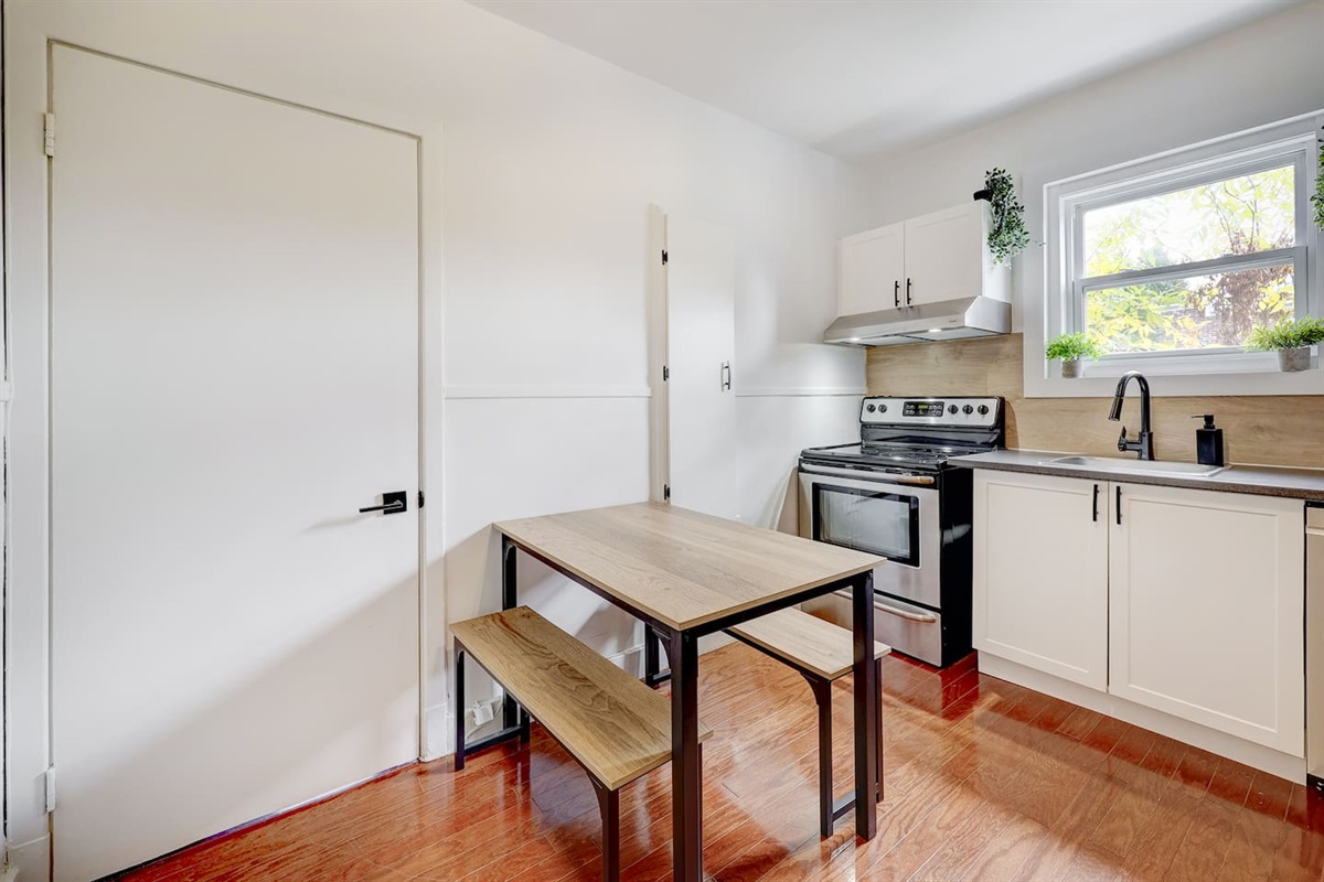 A stylish kitchenette paired with the perfect dining corner.