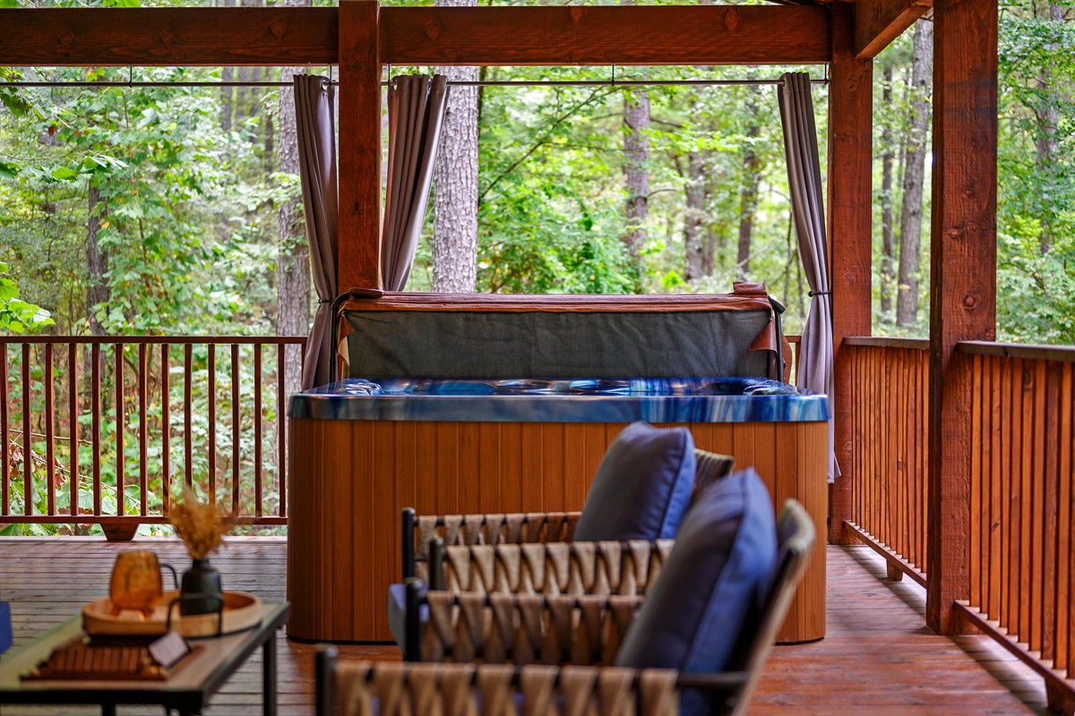 Curtain provided by hot tub for extra privacy.