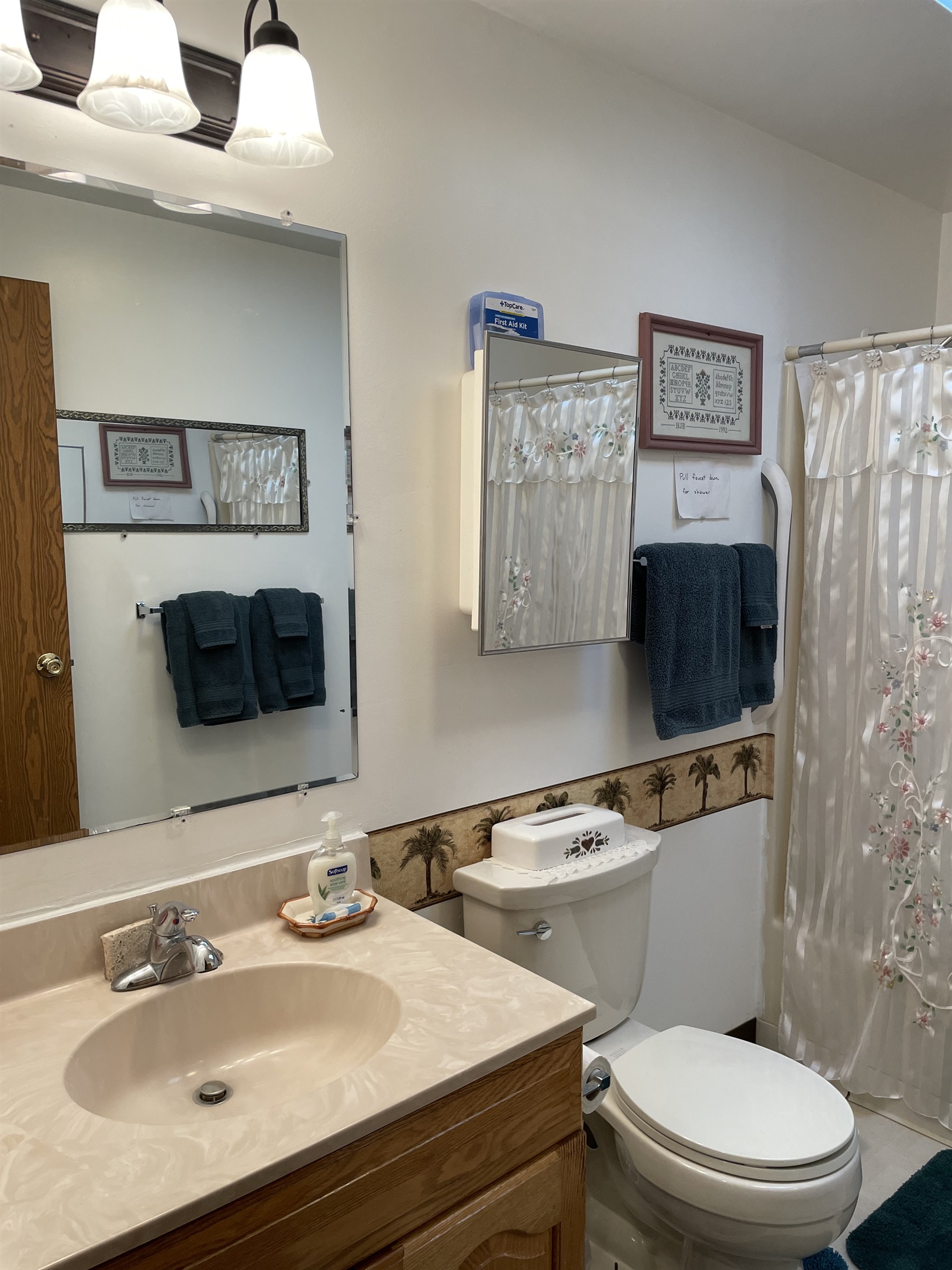 Bathroom w/ tub/shower in hallway