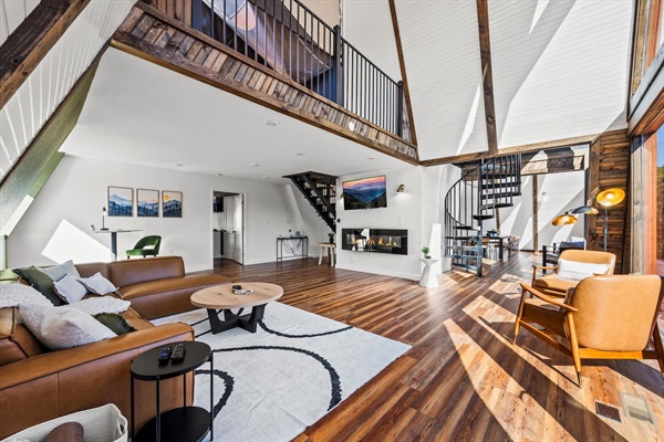 Living Room: Embrace relaxation in this sunlit space with stunning views and modern comforts!