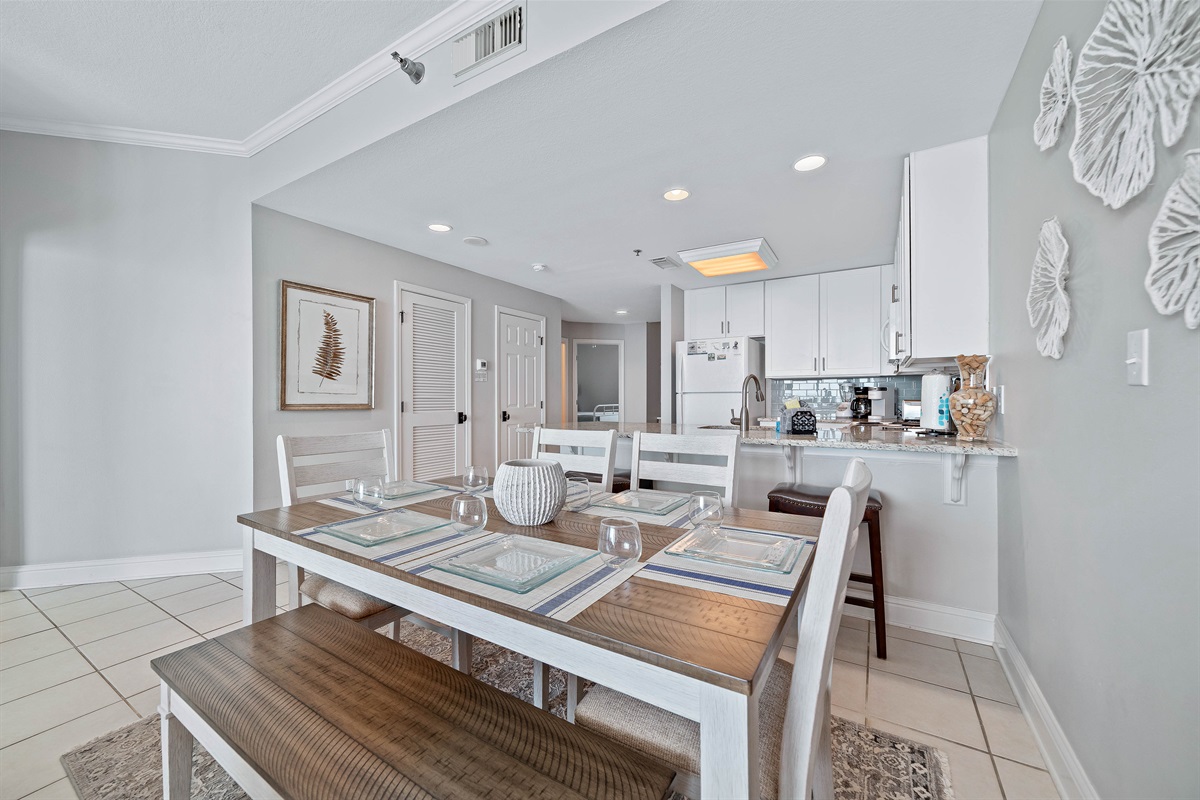 Gather, eat, and make memories. Our spacious dining area and adjacent breakfast bar provide plenty of room for guests to enjoy meals and conversations, creating the perfect setting for your vacation.