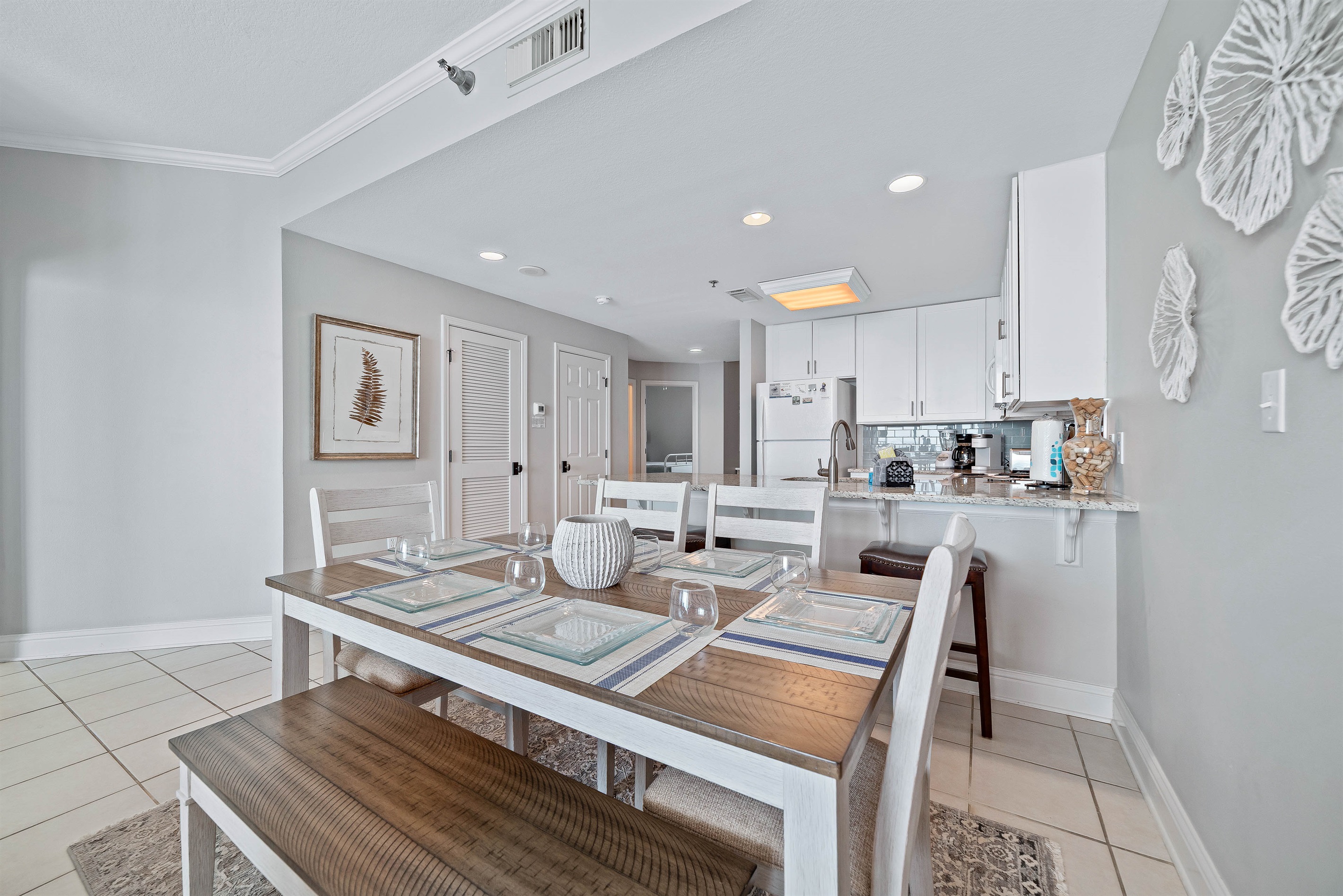 Gather, eat, and make memories. Our spacious dining area and adjacent breakfast bar provide plenty of room for guests to enjoy meals and conversations, creating the perfect setting for your vacation.