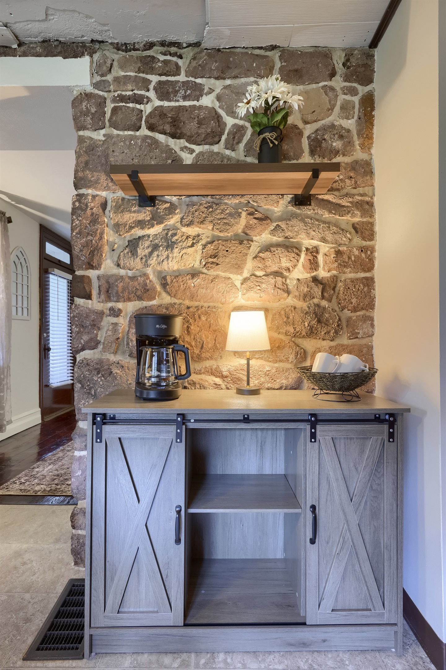 Coffee Pot with coffee grounds stocked.