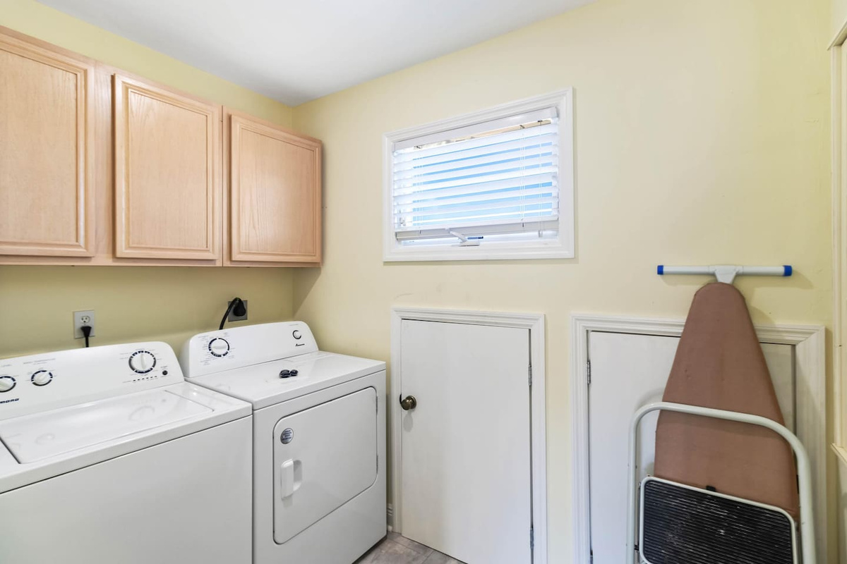 Use the full-size washer and dryer in the dedicated laundry room upstairs &mdash; pack lighter than you think you need to. The laundry is fast, private, and free.
