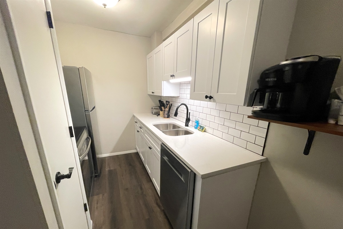 Kitchen with full size appliances and dishwasher