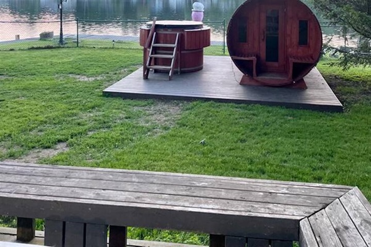 Outdoor hot tub area viewed from the deck