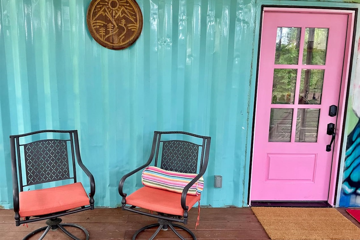 Outdoor seating perfect for your morning coffee watching the sunrise filter through the beautiful trees. 