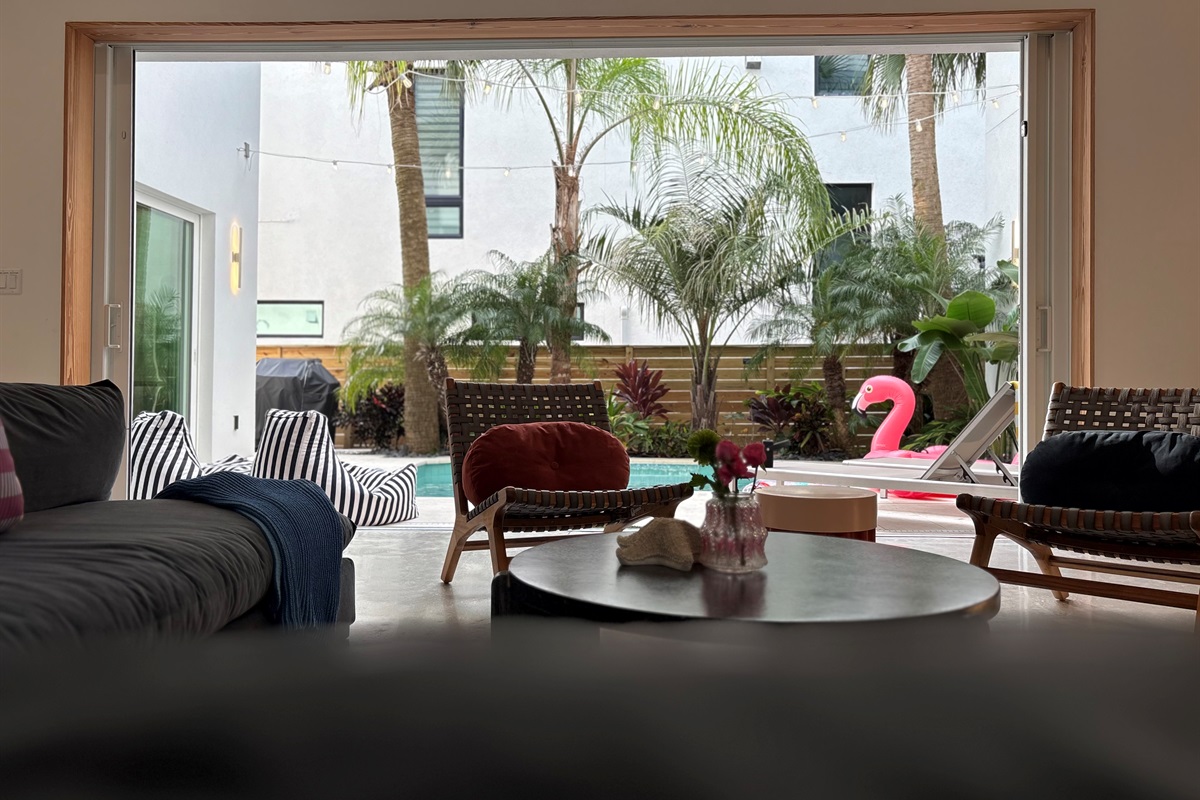 The ultimate indoor-outdoor vibe 🌴 Slide open the doors and let the pool days (and breezy nights) roll right in