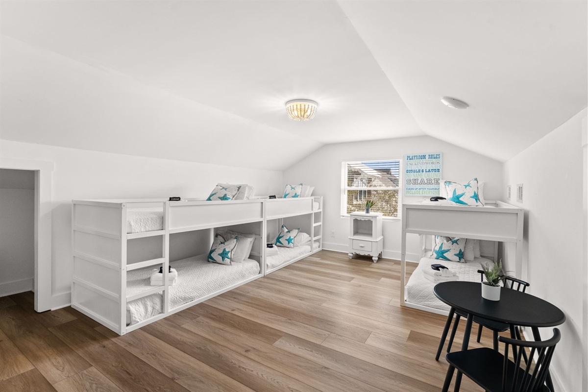 4th-floor bunk room: The ultimate kids' hangout with custom-built twin bunkbeds.