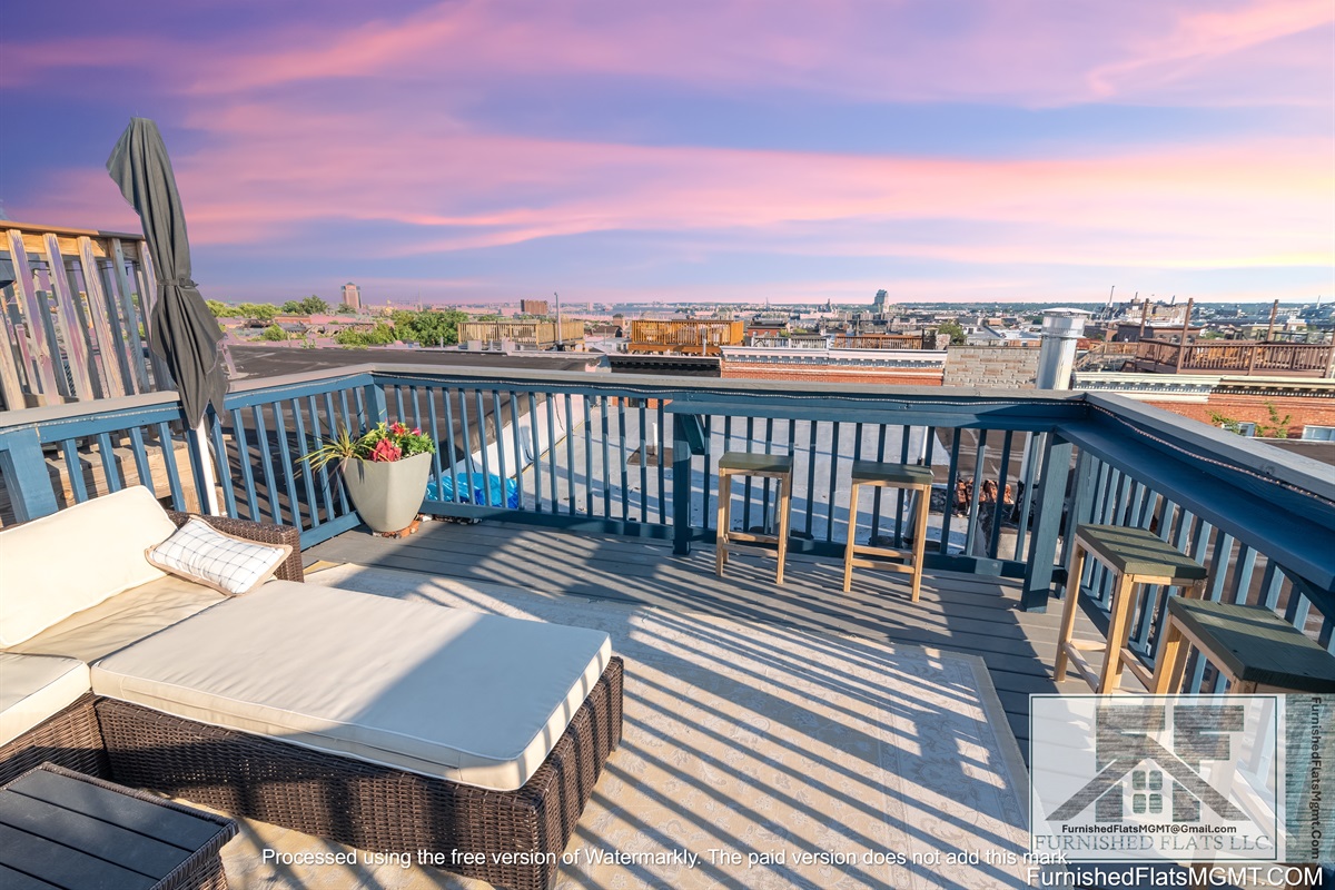 Two tiered roof top deck with panoramic views of the city skyline, harbor and park. Best views in the city!