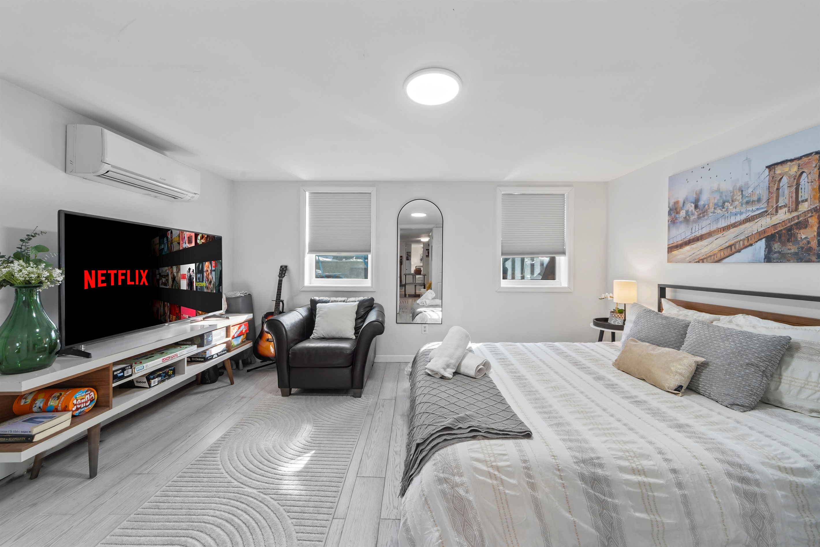 Wake up slowly in a bright, peaceful bedroom that makes restful sleep feel effortless after full days in the city.