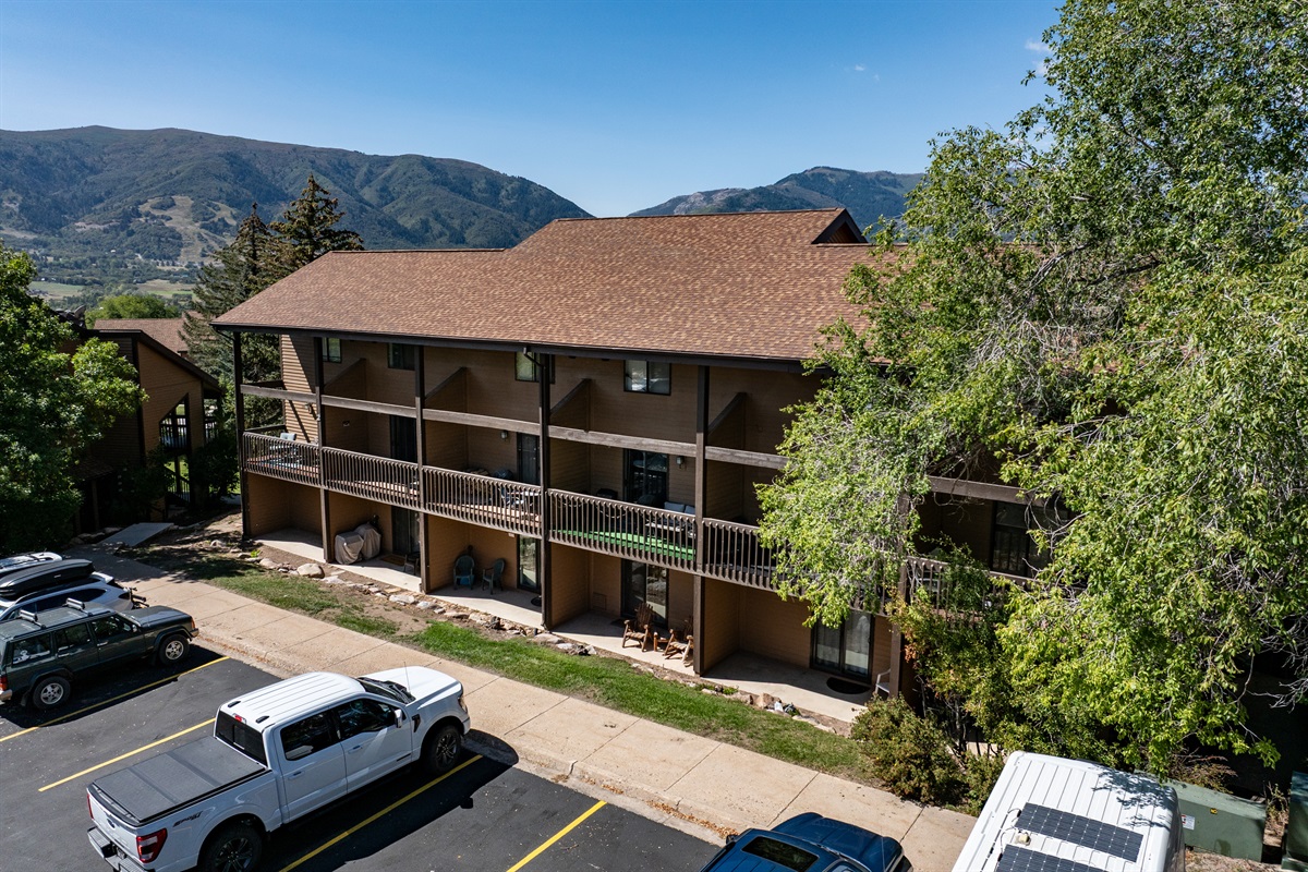 Wolf Lodge exterior with nearby parking and easy condo access.
