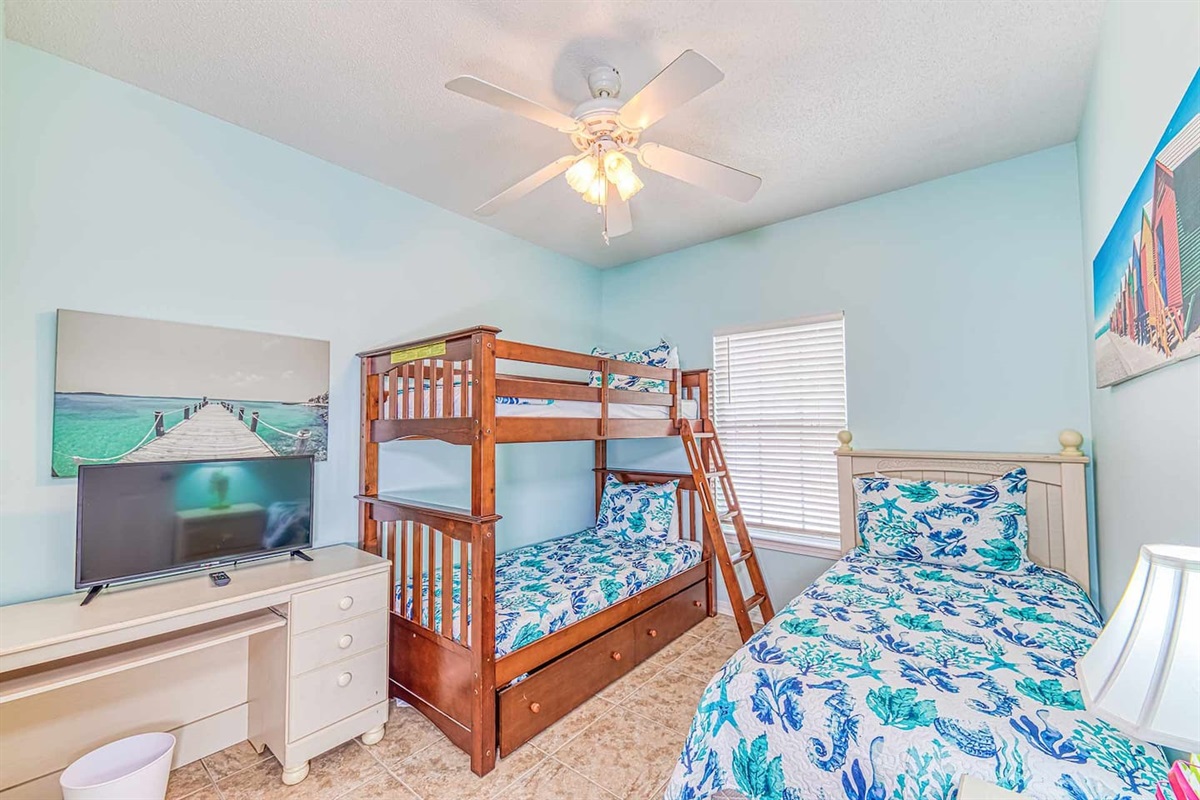 Bunk Room Retreat: Fun and vibrant space with twin bunks, perfect for young adventurers!