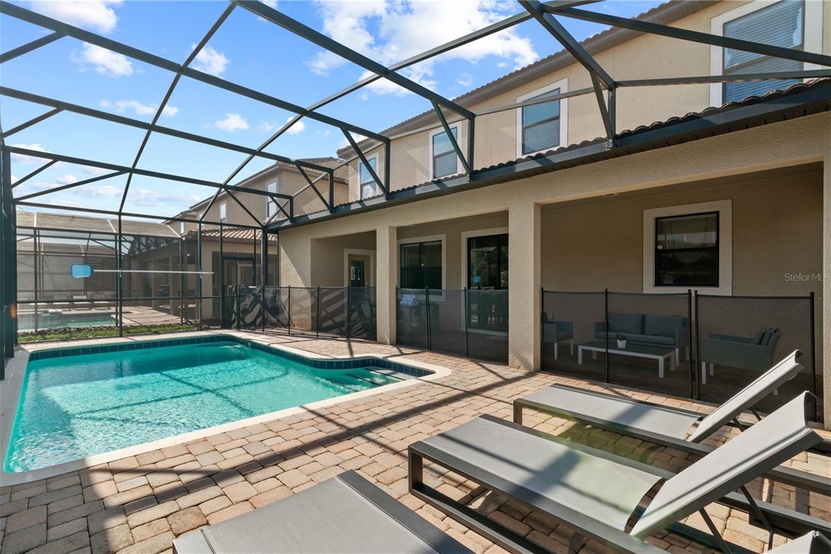 Child safety fence provided in pool area for those with little ones.