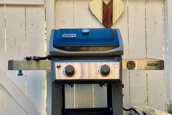 Fire up your Weber gas grill for a night in. With the covered porch nearby, dinner at the Chic Sheep Retreat is as tempting as a night out. 
