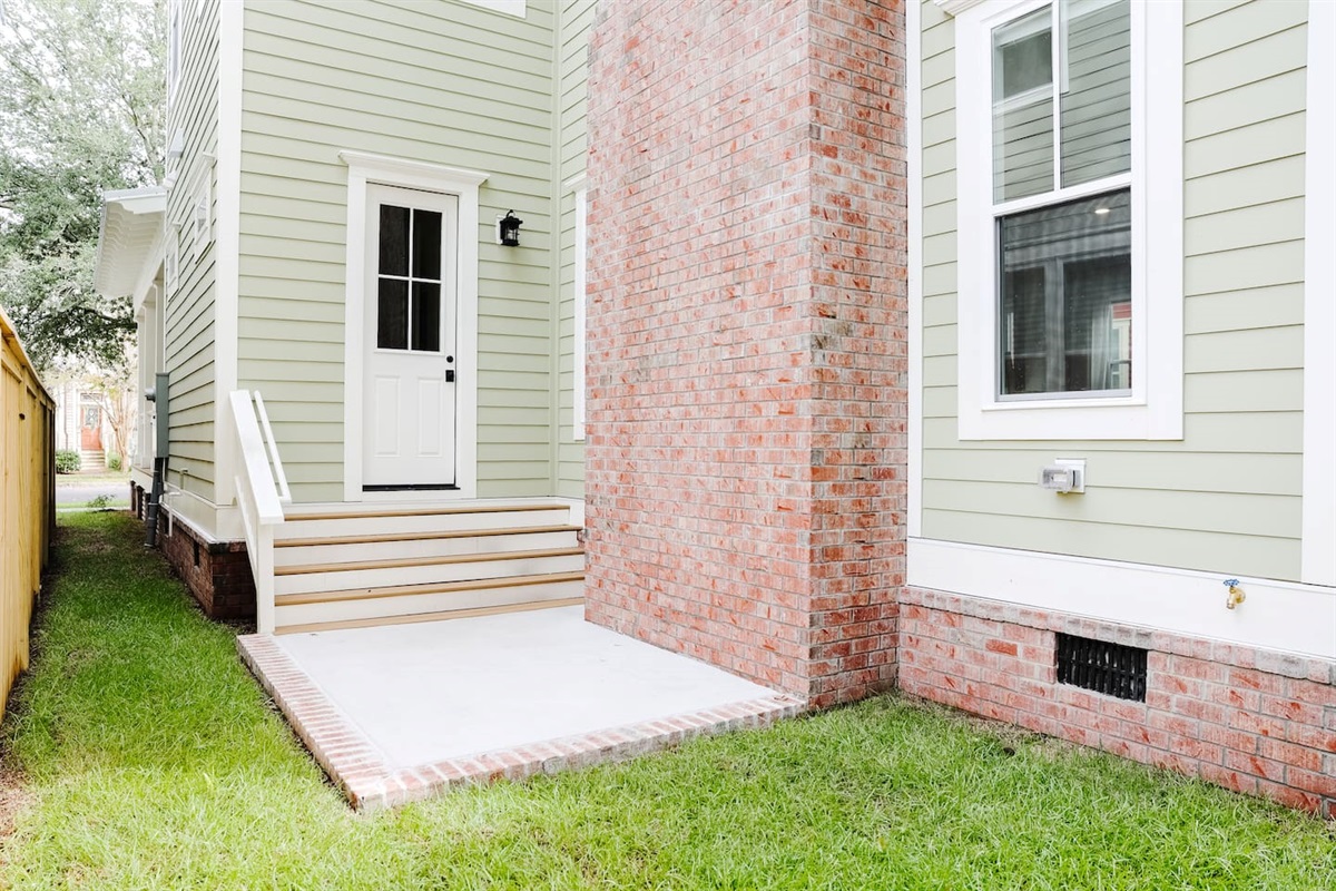 Outdoor patio is a great place to enjoy the coastal weather with friends. **will feature bistro table and market lights**