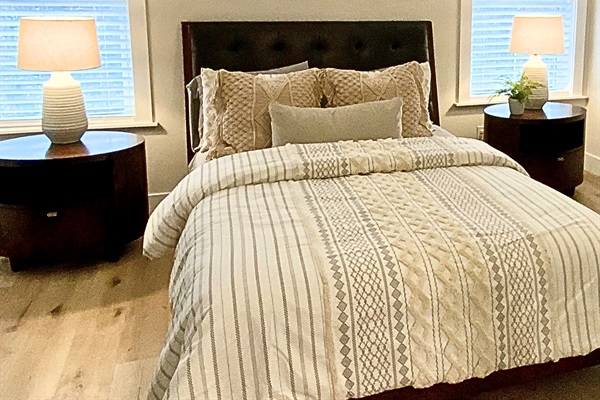 Neutral, boho style bedding and soaring vaulted ceilings! Closet and hangers provided. 