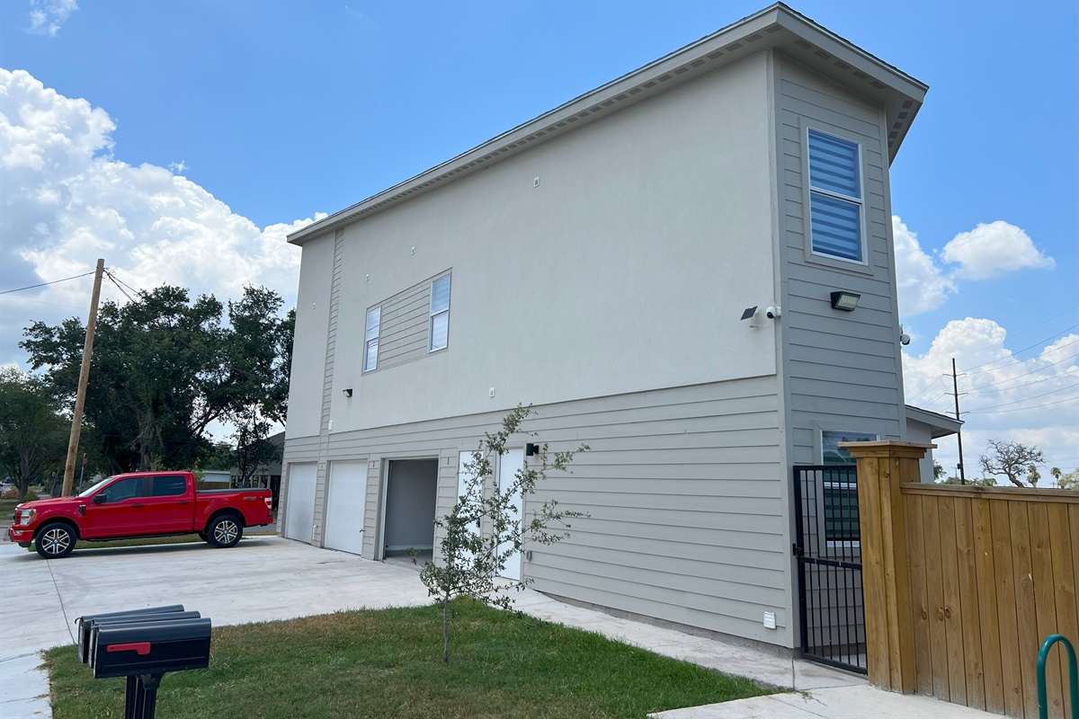 Building with Unit 1 Garage Open