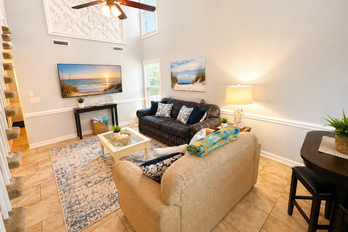 Living room with vaulted ceilings