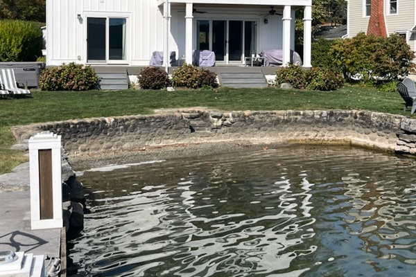 View of house while standing on the dock