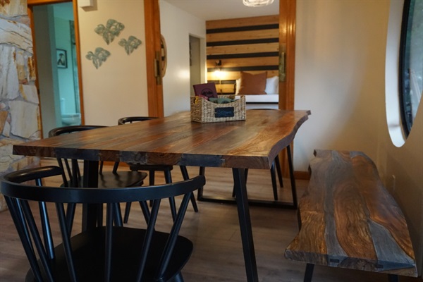 New "live edge" dining table with matching bench and chairs.