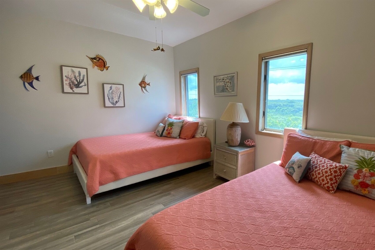Two queen beds in guestroom overlooking Guana State Park