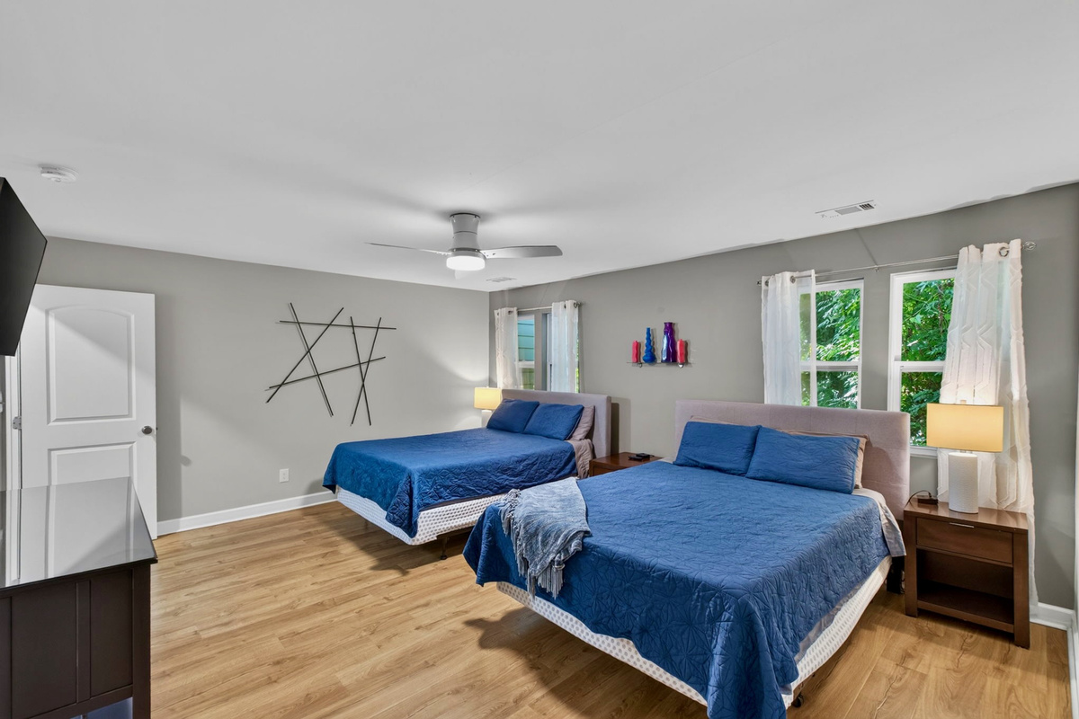 This bedroom is very spacious and well appointed