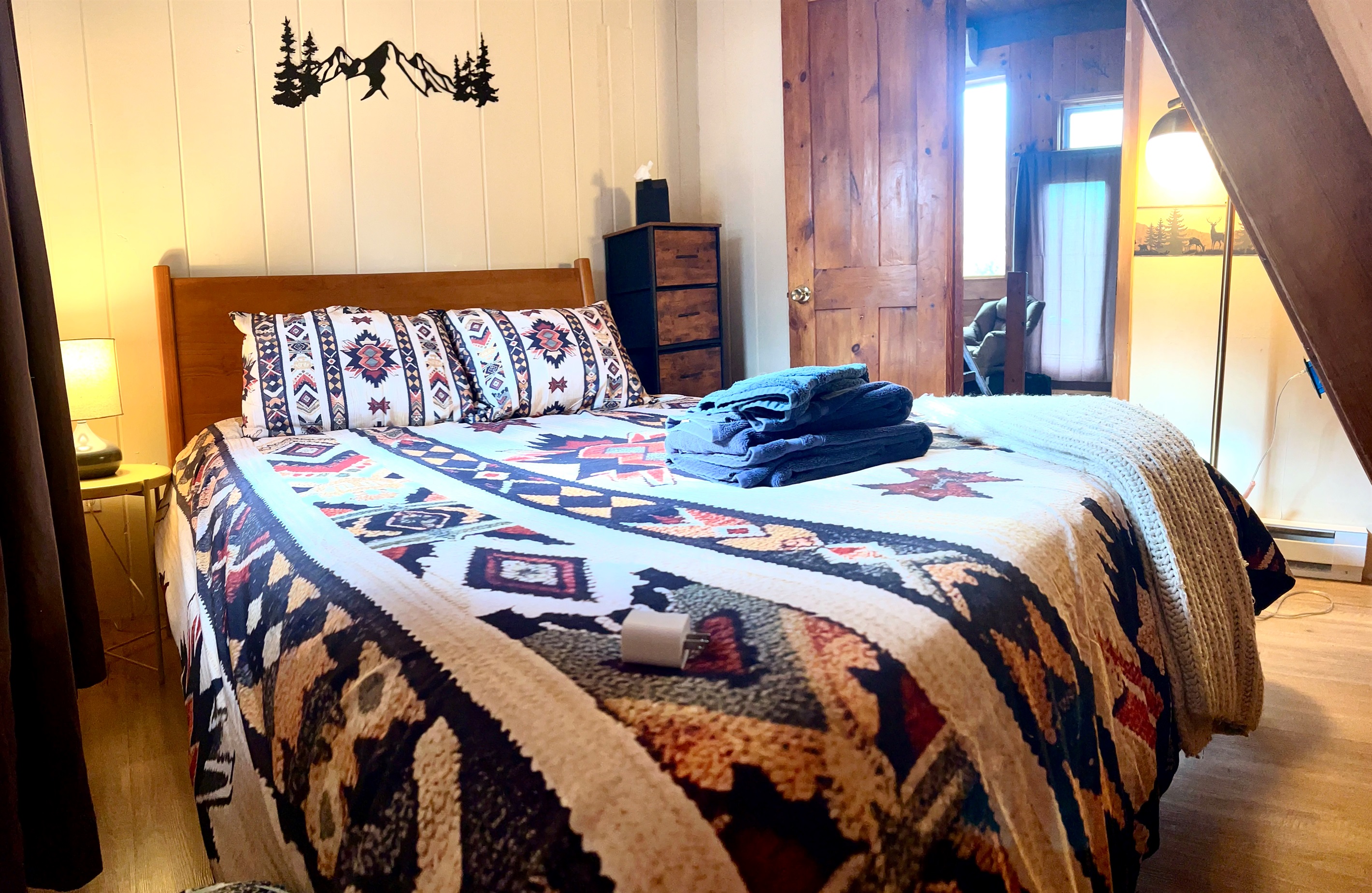 First floor bedroom with queen bed.