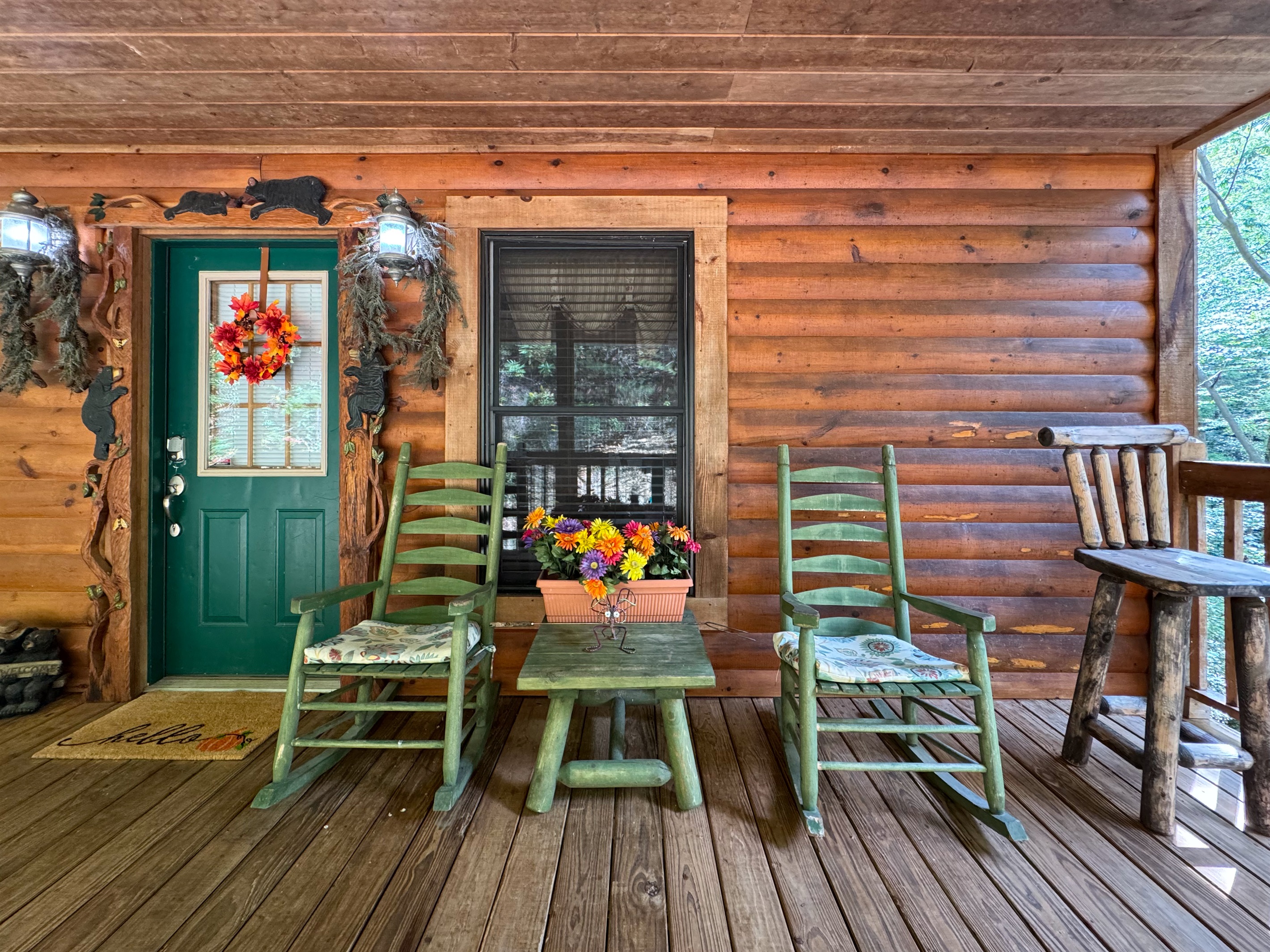 Front porch sittin’ is a common pastime at the cabin