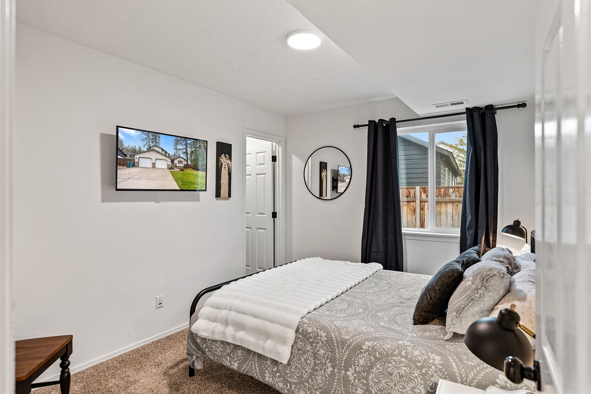 Bedroom 4 has Queen bed, walk in closet and smart tv.  Ground floor