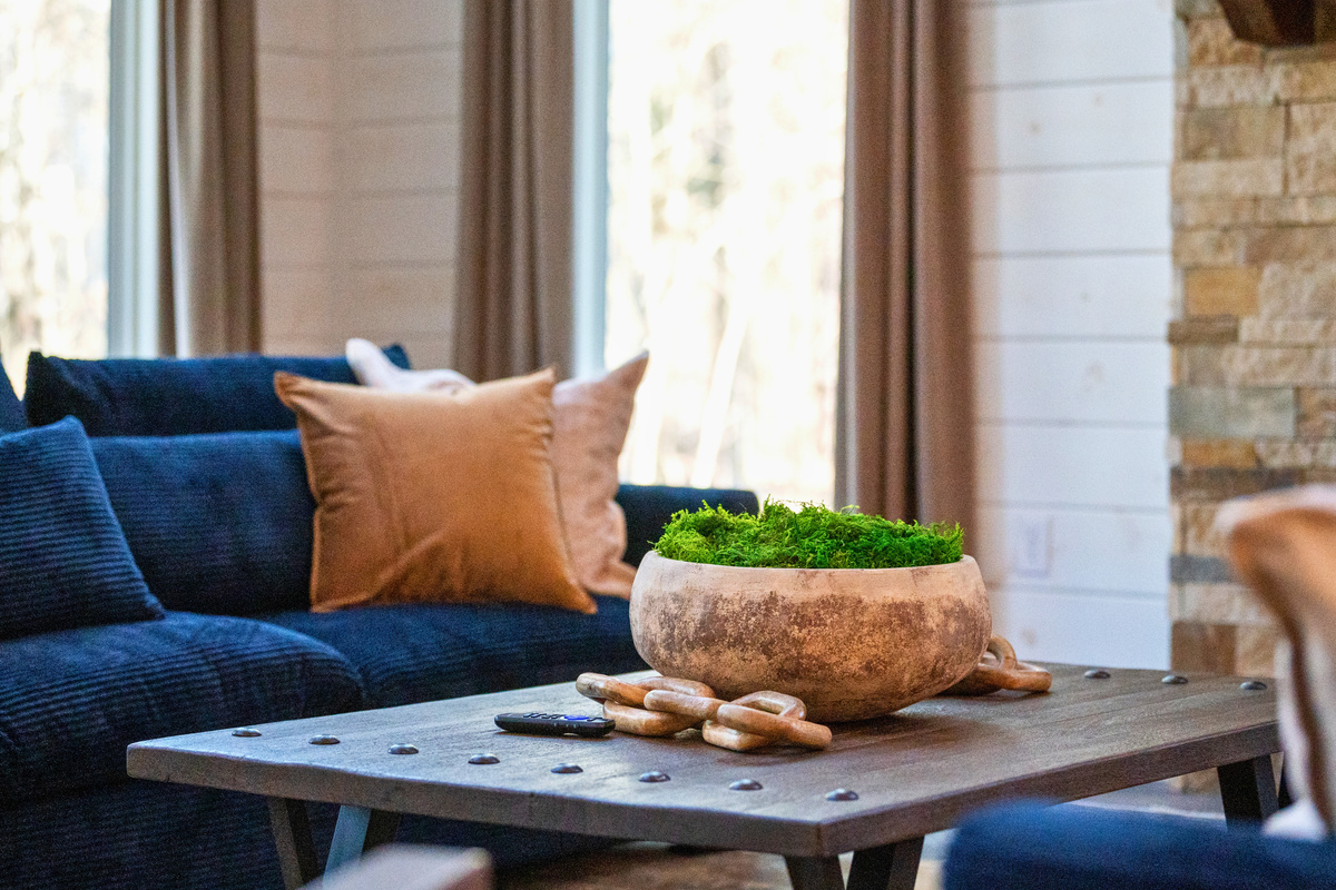 A cozy corner of the living room, perfect for unwinding with a book, a warm drink, or a good conversation by the fire.