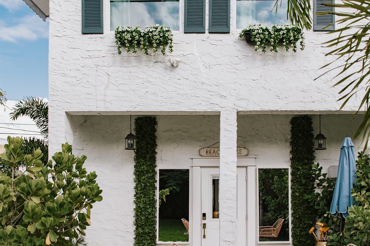 The rear cottage has a distinct charm and peaceful seating area.