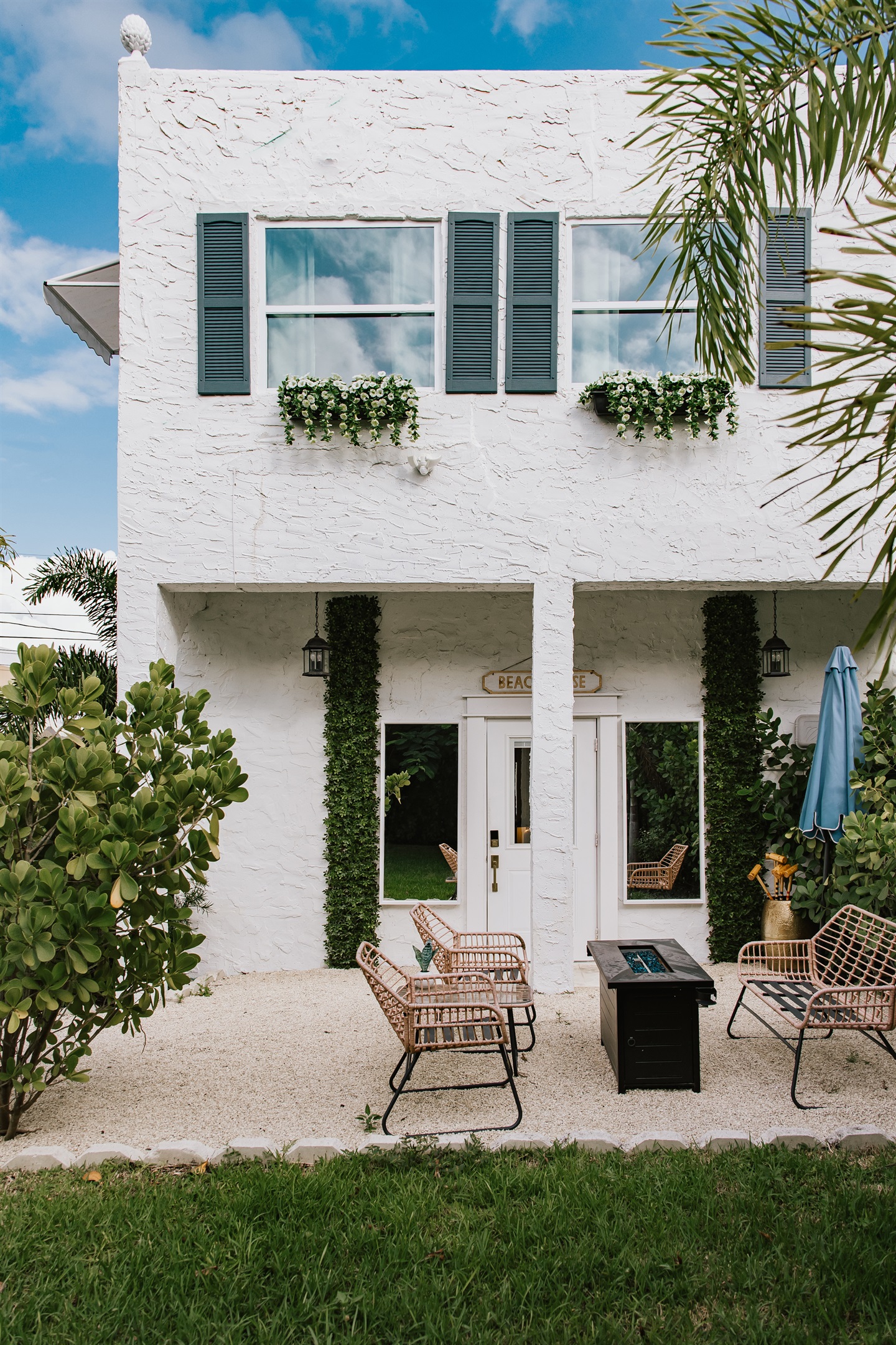 The rear cottage has a distinct charm and peaceful seating area.