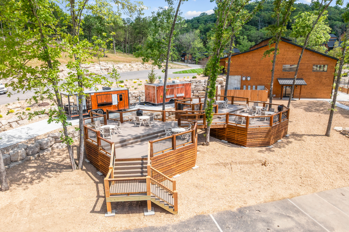 Tall Timbers has food trucks that serve great food and drinks, with dining areas. Take your food to the pool, back to the cabin or just eat it right there while it's hot!