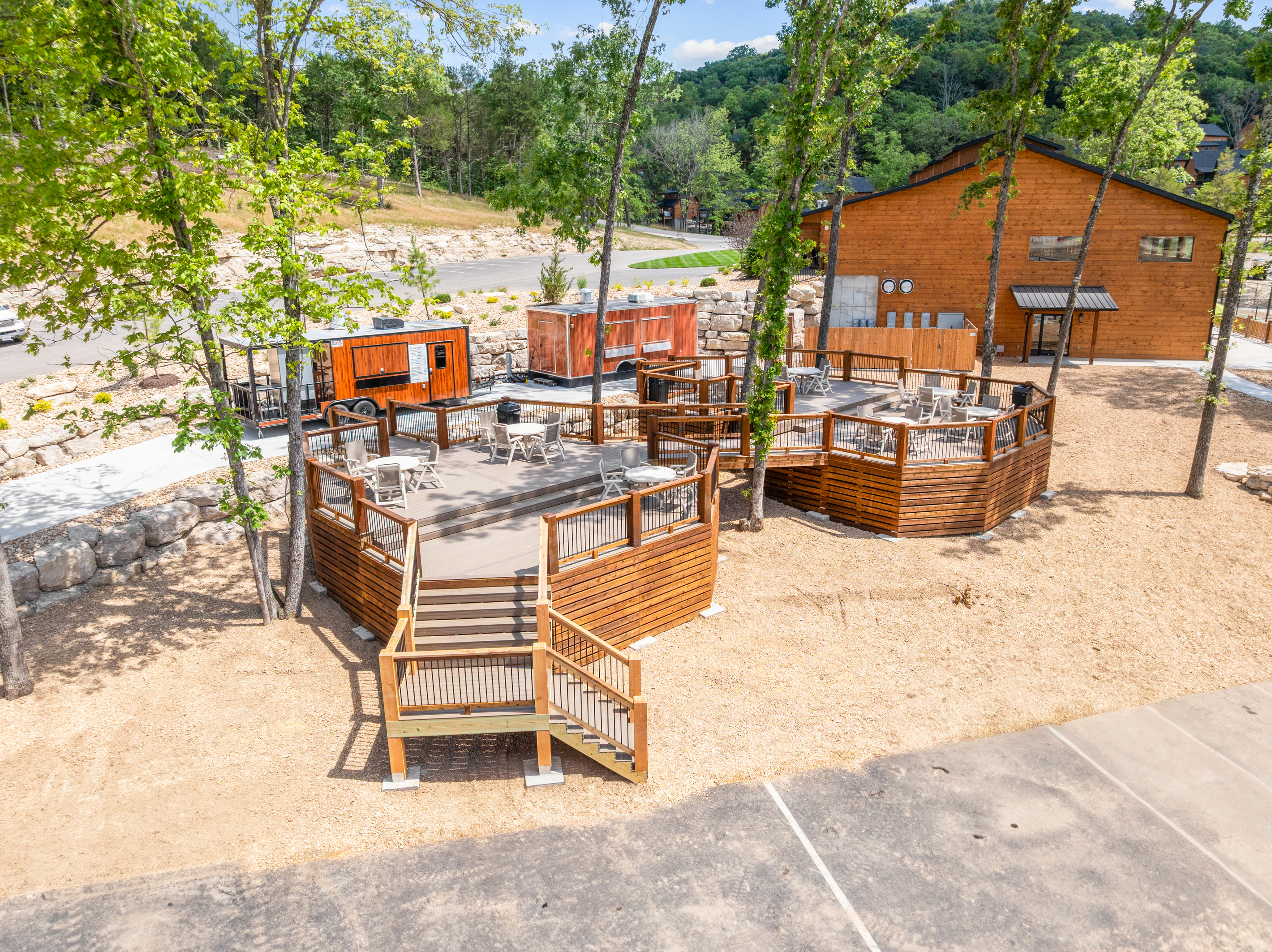 Tall Timbers has food trucks that serve great food and drinks, with dining areas. Take your food to the pool, back to the cabin or just eat it right there while it's hot!