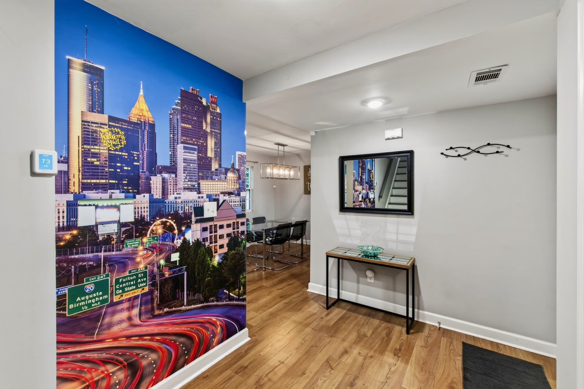 A full -wall mural of Atlanta greets you as you step inside. Welcome to the city and your "home away from home"!